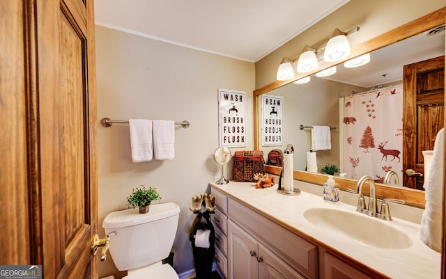 bathroom featuring vanity, a shower with curtain, and toilet