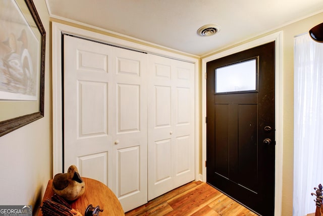 foyer featuring light hardwood / wood-style floors