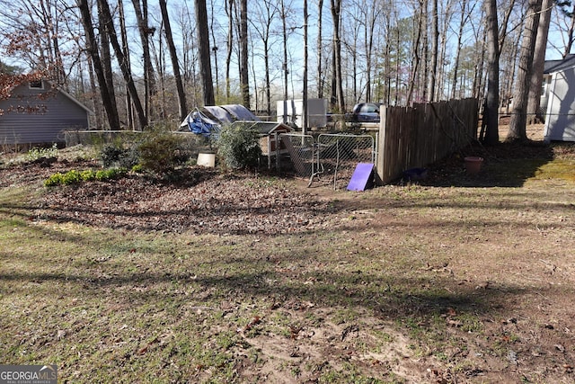 view of yard with fence