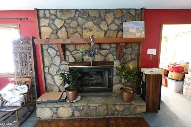 details featuring a stone fireplace