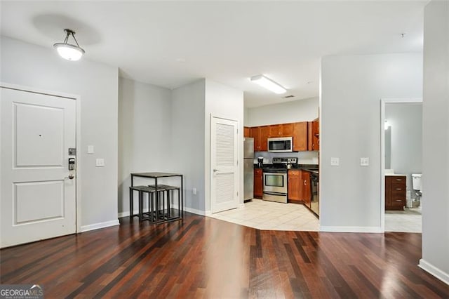 foyer entrance featuring hardwood / wood-style floors