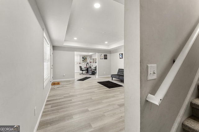 4901 Planters Walk, Douglasville, GA 30135 - interior space featuring a tray ceiling and light hardwood / wood-style flooring