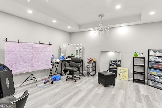 4901 Planters Walk, Douglasville, GA 30135 - home office featuring a raised ceiling, an inviting chandelier, and light hardwood / wood-style floors