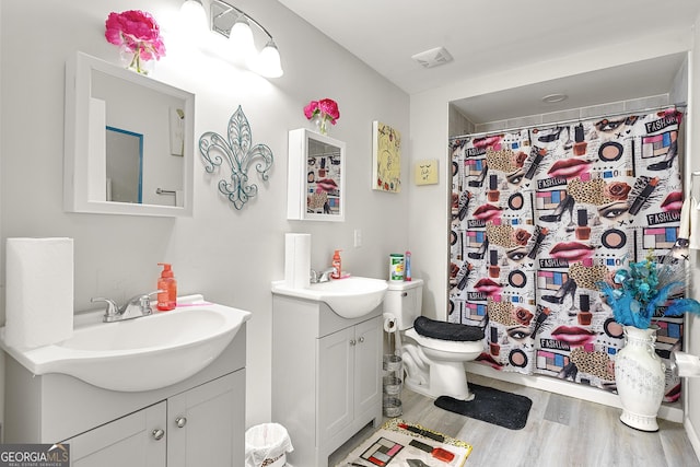 4901 Planters Walk, Douglasville, GA 30135 - bathroom featuring vanity, hardwood / wood-style flooring, and toilet