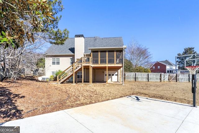4901 Planters Walk, Douglasville, GA 30135 - back of house with a sunroom and a patio