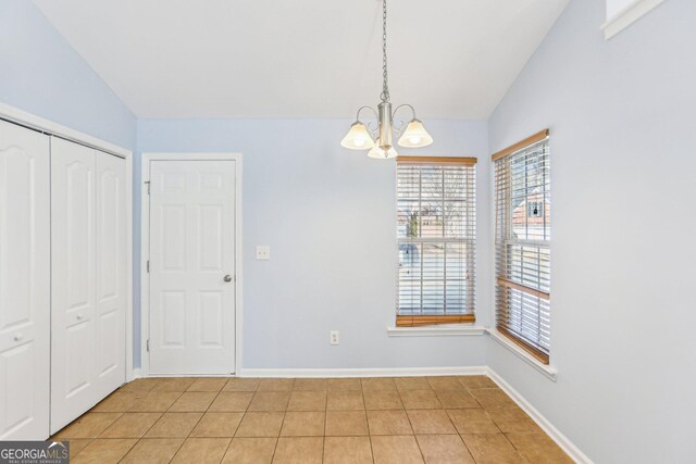 unfurnished dining area featuring vaulted ceiling, hardwood / wood-style floors, and ceiling fan