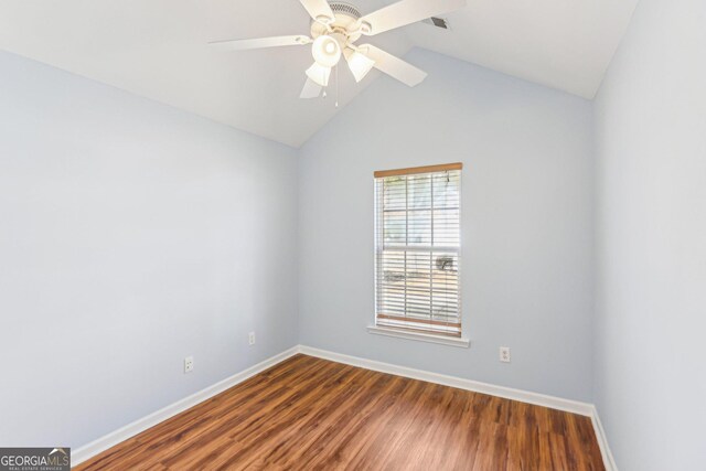 unfurnished room featuring hardwood / wood-style floors, vaulted ceiling, and ceiling fan