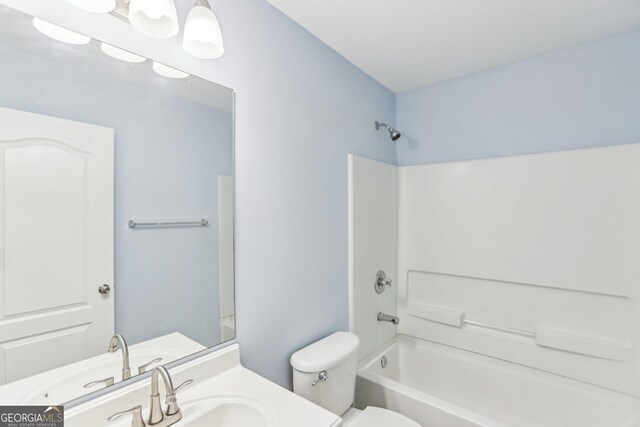 bathroom with a bathtub and a wealth of natural light