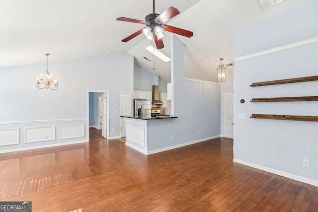 unfurnished living room with hardwood / wood-style flooring