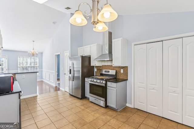 interior space featuring high vaulted ceiling, dark hardwood / wood-style floors, and ceiling fan