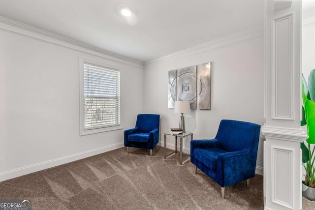 living area featuring ornamental molding and carpet floors