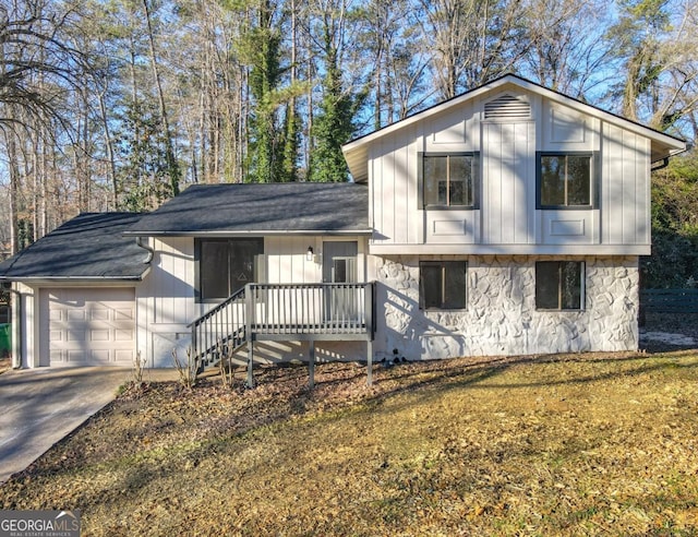 split level home featuring a garage