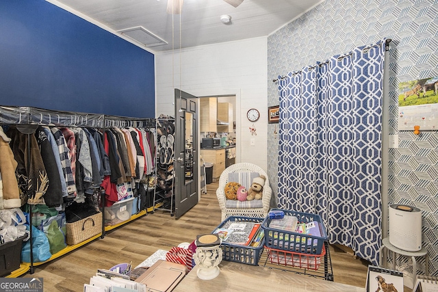 walk in closet featuring hardwood / wood-style floors