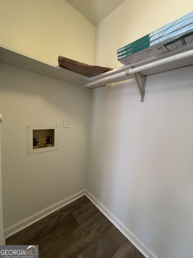 washroom with washer hookup and dark hardwood / wood-style floors