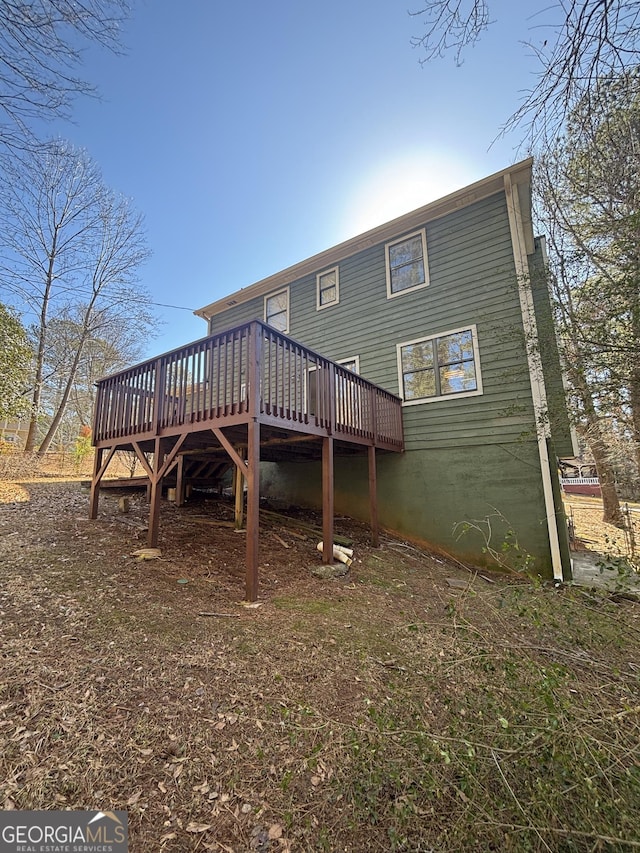 rear view of house with a deck