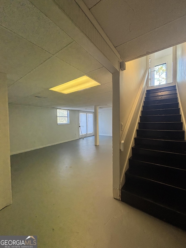 basement with a drop ceiling