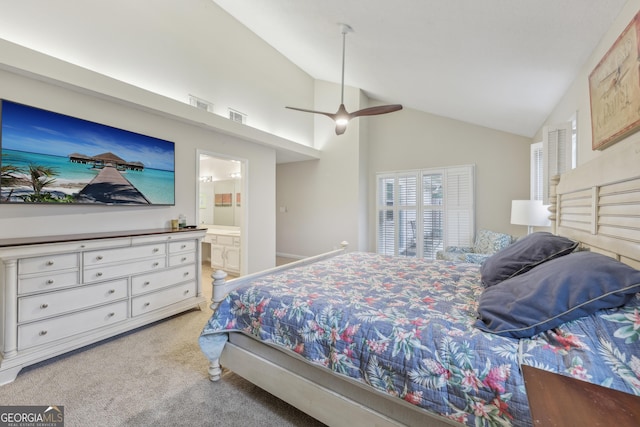 carpeted bedroom featuring ensuite bathroom, ceiling fan, and high vaulted ceiling