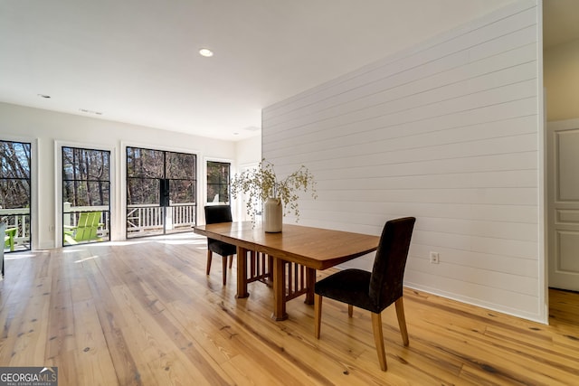 dining space featuring light hardwood / wood-style flooring