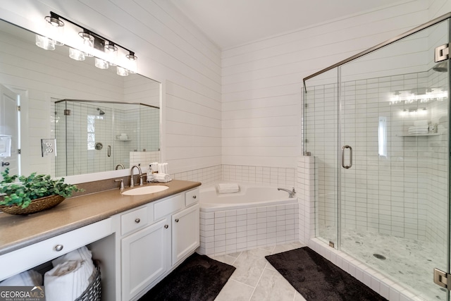 bathroom featuring tile patterned floors, vanity, and plus walk in shower