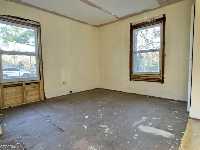 spare room featuring a healthy amount of sunlight