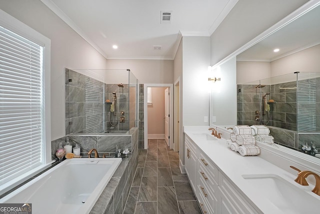 bathroom with crown molding, shower with separate bathtub, and vanity