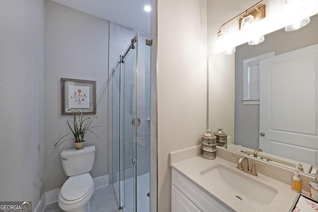 bathroom with vanity, toilet, and walk in shower