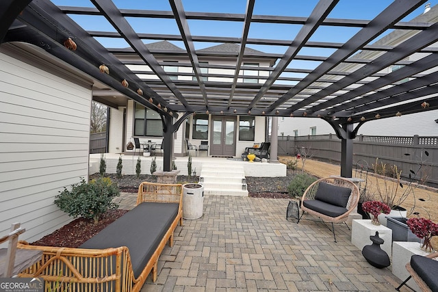 view of patio featuring a pergola