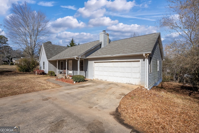 ranch-style house with a garage and a porch