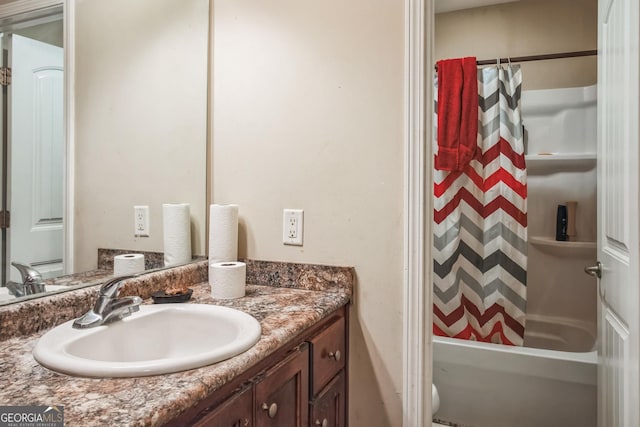 bathroom featuring vanity and shower / tub combo with curtain