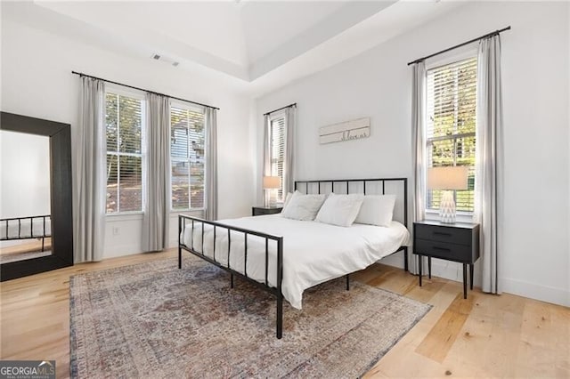 bedroom with light wood-type flooring