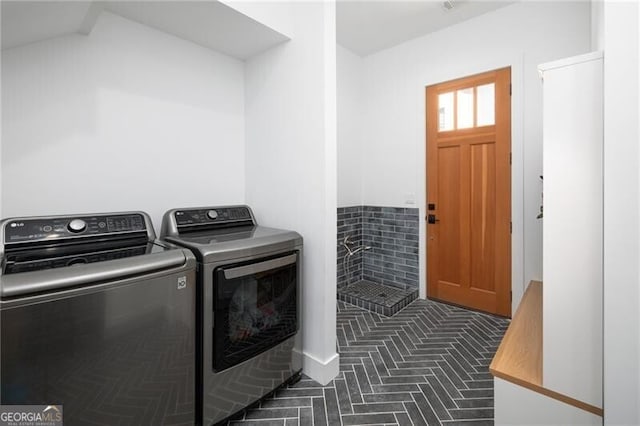 laundry area featuring independent washer and dryer