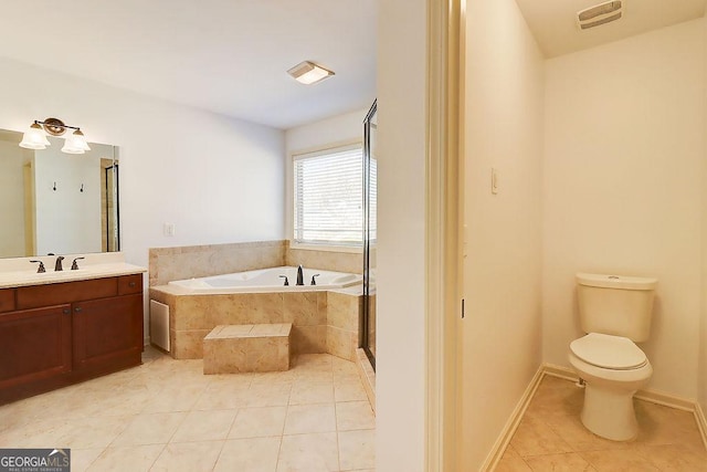 full bathroom with tile patterned flooring, visible vents, toilet, a bath, and vanity