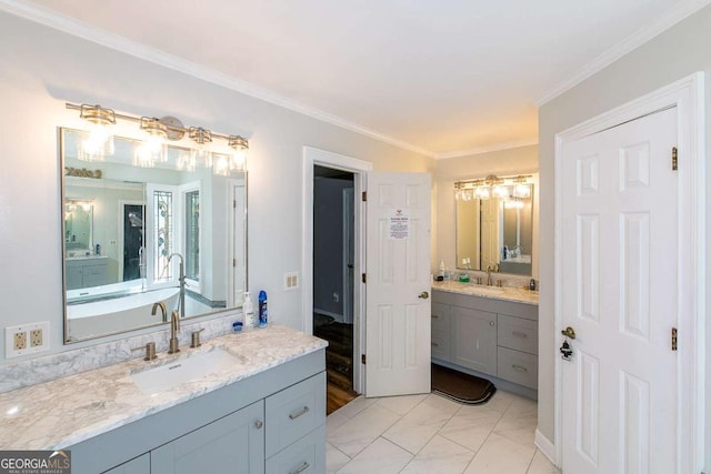 bathroom featuring vanity and crown molding