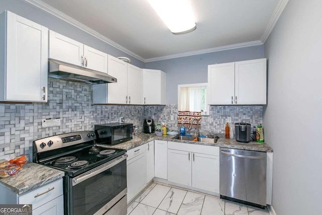 kitchen with sink, white cabinetry, crown molding, tasteful backsplash, and appliances with stainless steel finishes