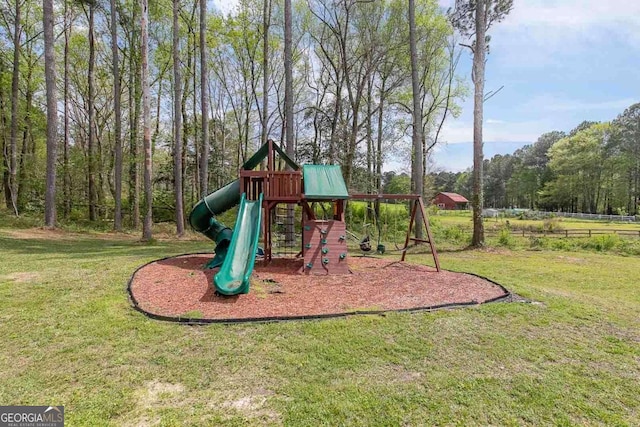 view of play area featuring a lawn