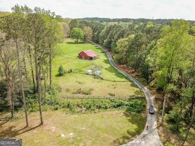 birds eye view of property featuring a rural view