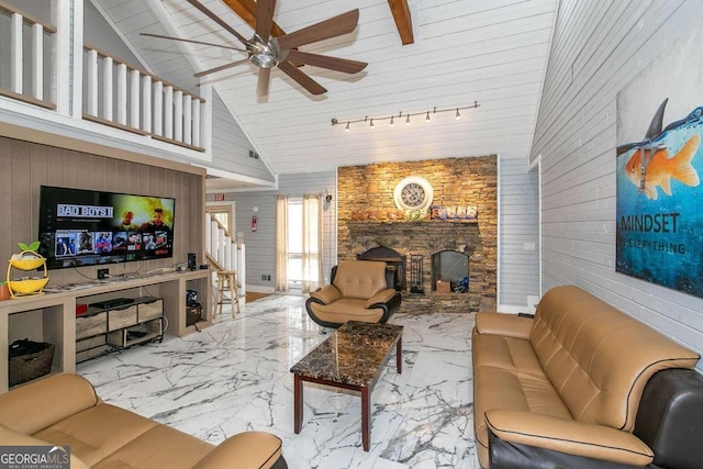 living room featuring high vaulted ceiling, a fireplace, and ceiling fan