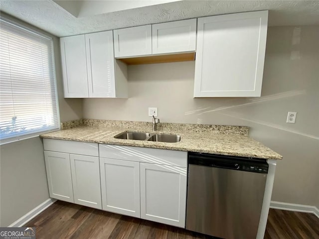 kitchen featuring sink, dark wood-type flooring, dishwasher, light stone counters, and white cabinets