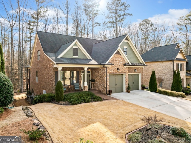 craftsman-style house featuring a garage and a porch