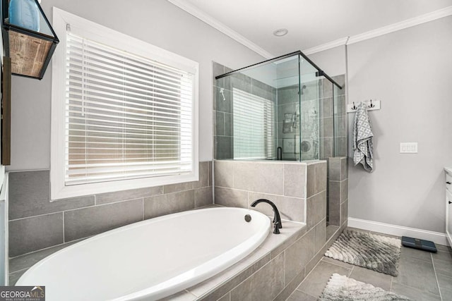 bathroom with crown molding, vanity, tile patterned floors, and plus walk in shower