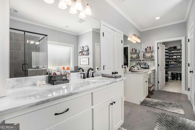 bathroom with walk in shower, tile patterned floors, ornamental molding, and vanity