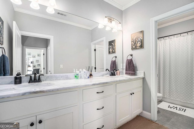 bathroom featuring tile patterned flooring, vanity, ornamental molding, curtained shower, and toilet