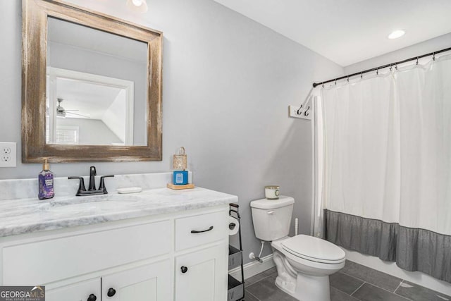 full bathroom with vanity, shower / bath combo, tile patterned floors, and toilet