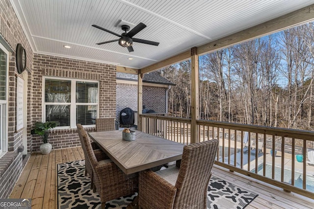 wooden terrace with ceiling fan