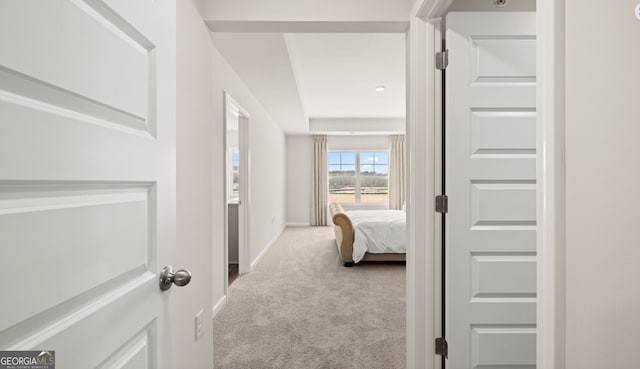 313 Sound Cir Unit 140, Stockbridge, GA 30281 - hallway with carpet and baseboards