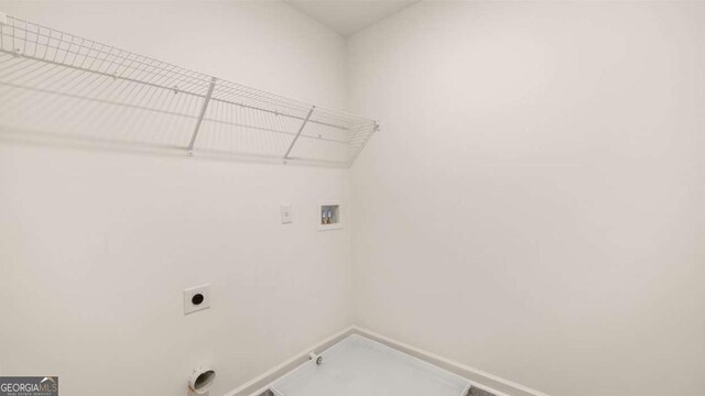 313 Sound Cir Unit 140, Stockbridge, GA 30281 - laundry area featuring hookup for a washing machine, hookup for an electric dryer, gas dryer hookup, and baseboards