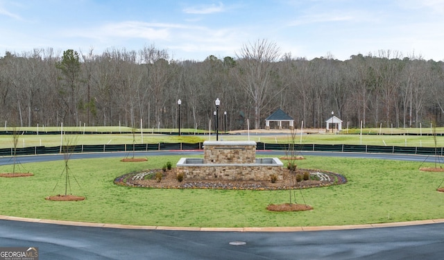 313 Sound Cir Unit 140, Stockbridge, GA 30281 - view of property's community with a lawn and a view of trees