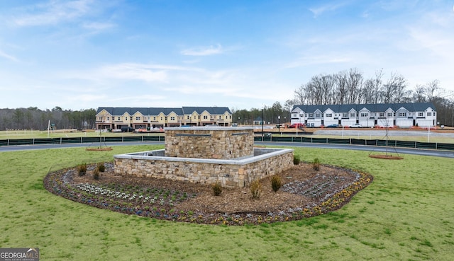 313 Sound Cir Unit 140, Stockbridge, GA 30281 - view of property's community with a lawn