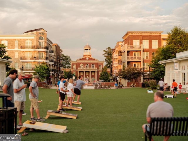 view of home's community featuring a yard