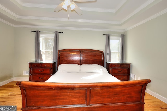 bedroom with ceiling fan and light hardwood / wood-style flooring